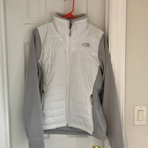 North face jacket. White/ grey sleeves ( sleeves are fleece). Perfect condition